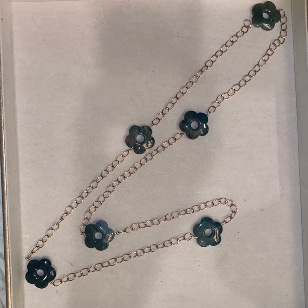 Long gold plated silver necklace features 6 carved green agate flowers